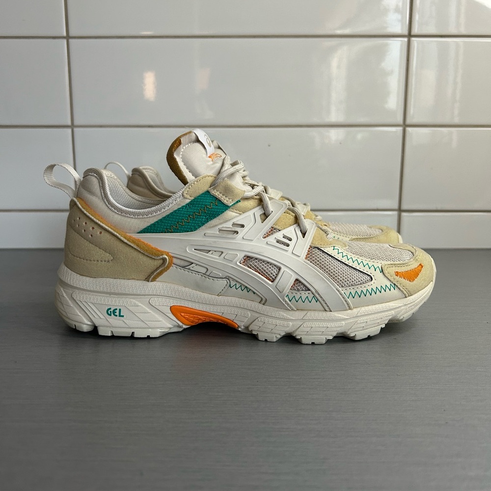 Asics Gel-Designed Neutral Running Shoe — Cream with Teal & Orange Accents